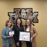 NWU Honors Academy Staff receives reaccreditation award. L to R: Andrea Howell - staff assistant, Heather Aruba - WHA director and Krista Cox - assistant director. 